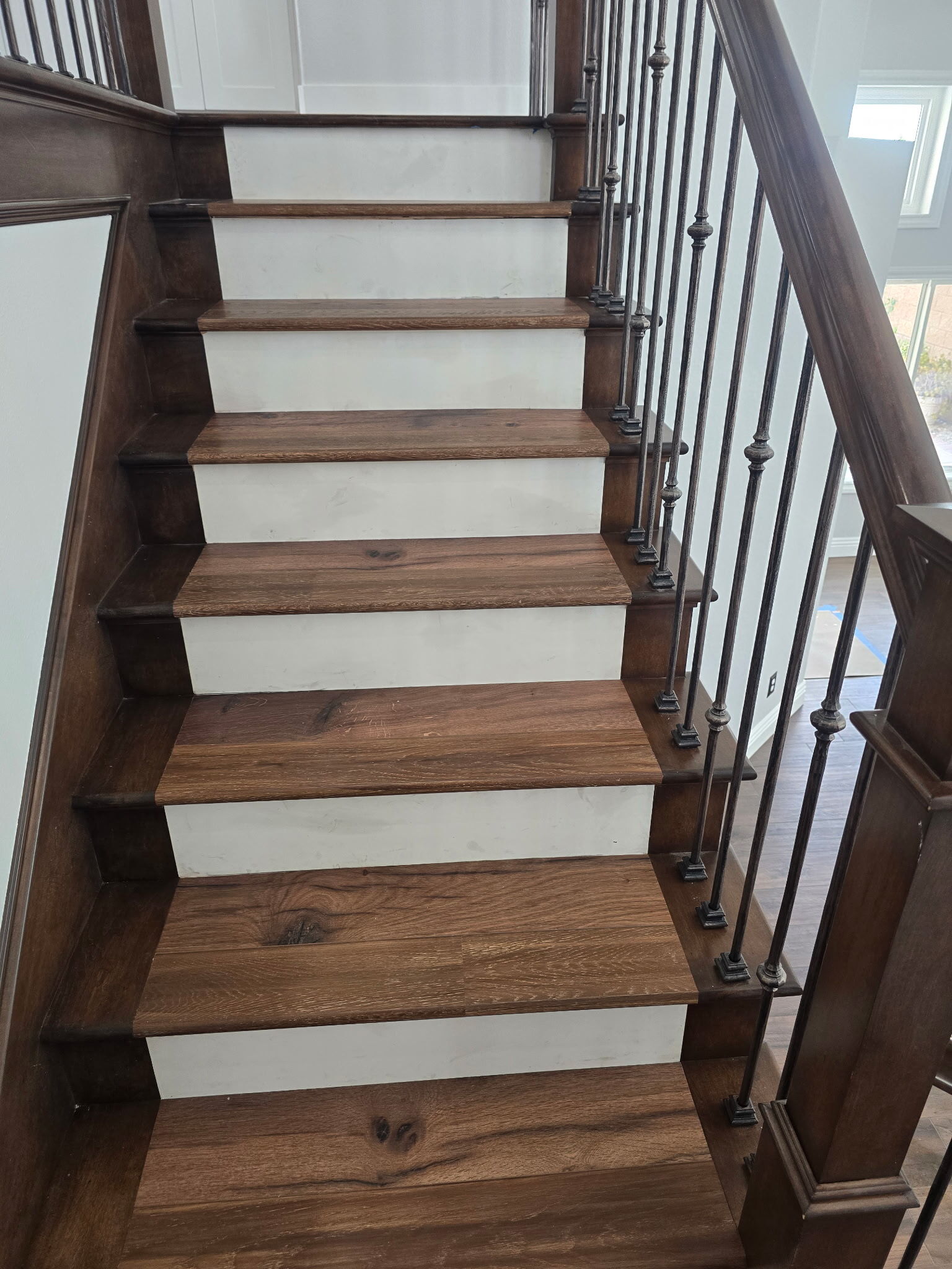 Stair tread install flooring project in Costa Mesa